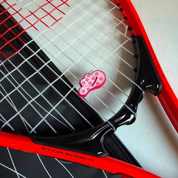 Clara’s Yeehaw dampener on their racket